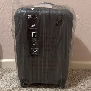 Traveler's Choice Black Rolling Carry-On Luggage